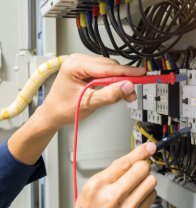 Wired Up Ltd | Electrician Working On Switchboard 